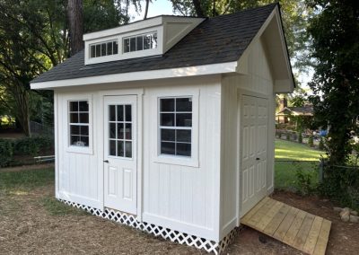 10 x 12 Heritage 812 pitch with dormer, single door and window added