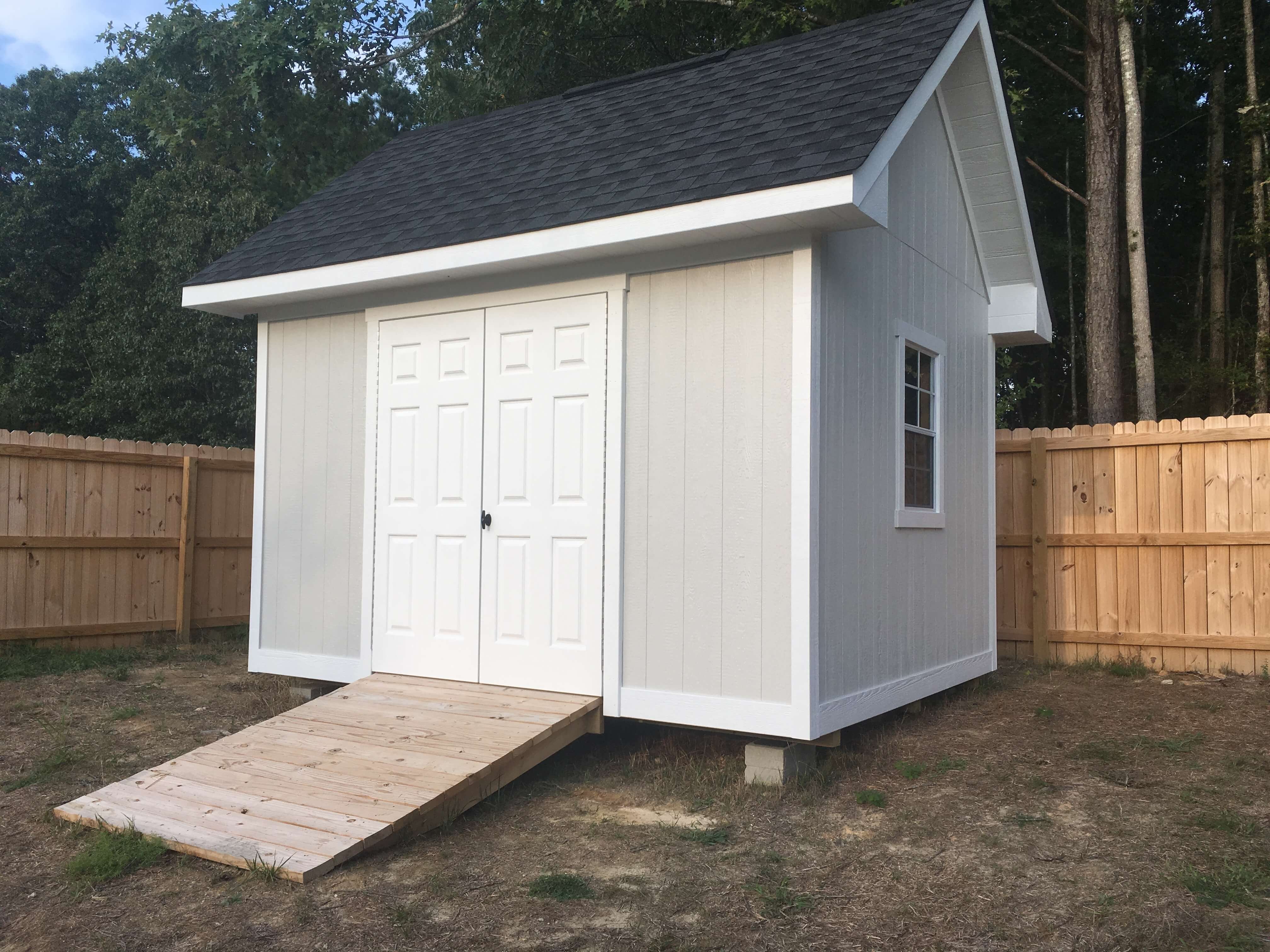 off white Heritage 8/12 Roof Pitch with dark gray roof, white trim and ramp