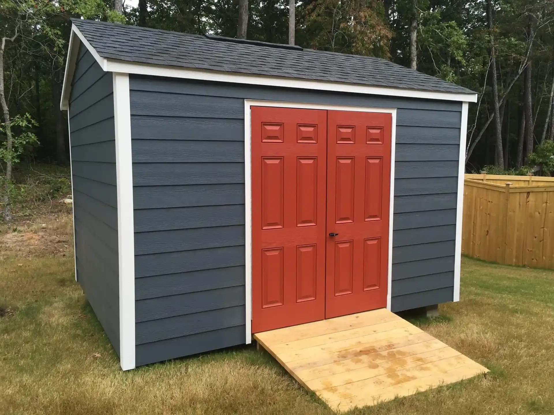 navy statesman with res door, white trim and ramp