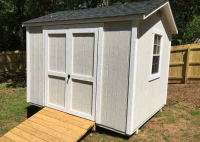 Statesman shed with gable doors and a window